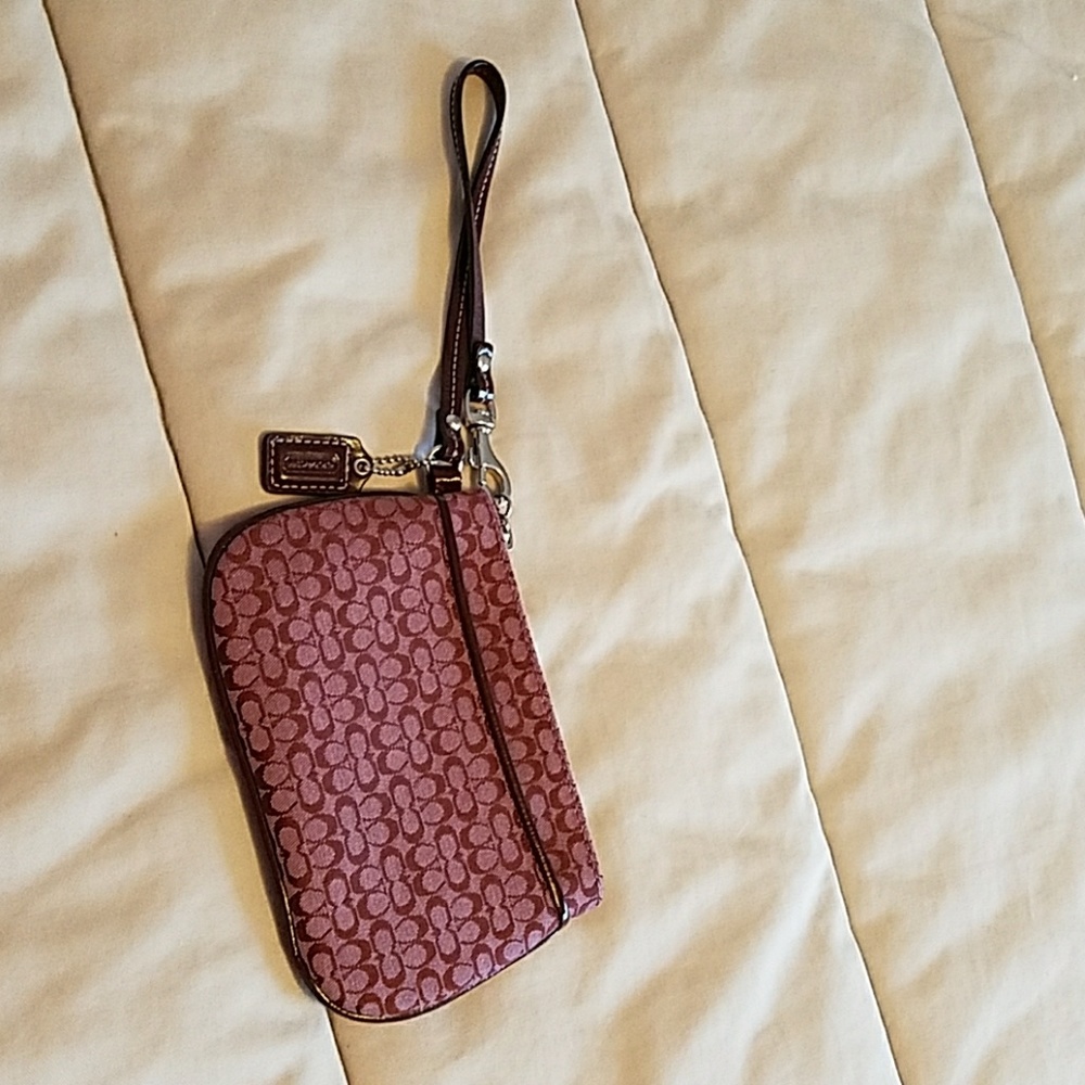 COACH wristlet burgundy never used